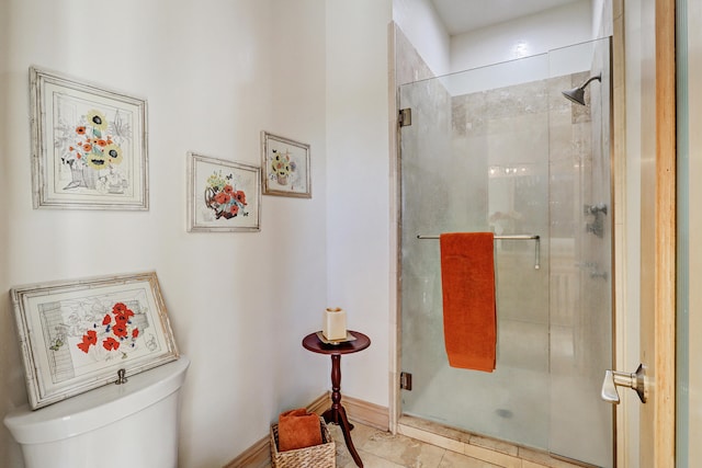 bathroom with walk in shower, toilet, and tile patterned floors