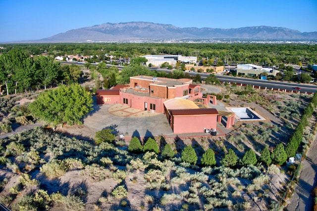 drone / aerial view featuring a mountain view