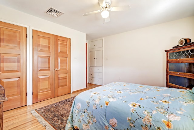 bedroom featuring wood-type flooring and ceiling fan