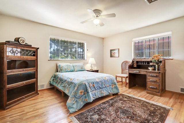 bedroom featuring ceiling fan and light hardwood / wood-style floors