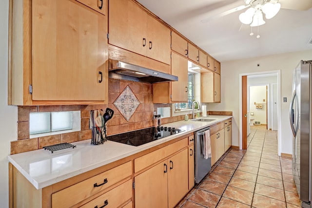 kitchen featuring appliances with stainless steel finishes, decorative backsplash, light tile patterned flooring, ventilation hood, and sink