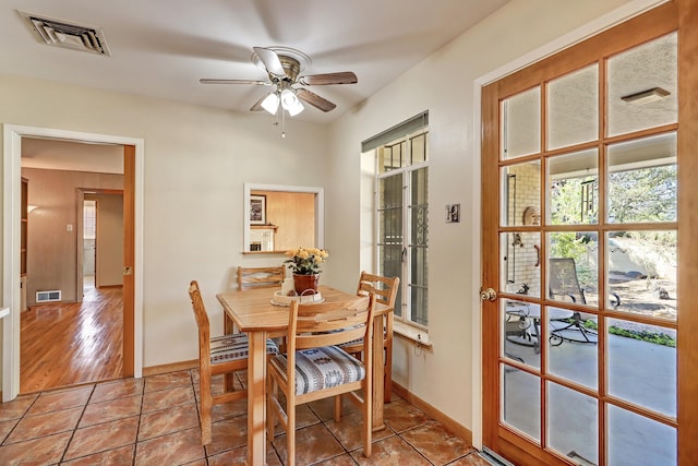 dining room featuring ceiling fan and light hardwood / wood-style floors