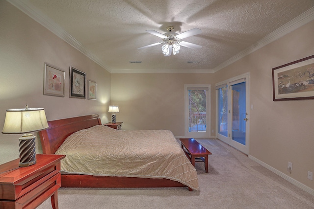 carpeted bedroom with a textured ceiling, ceiling fan, ornamental molding, and access to outside