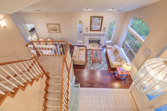 living room with a fireplace and hardwood / wood-style floors