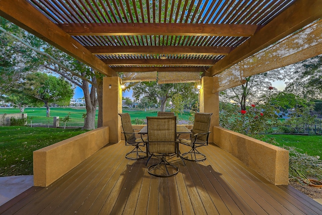 wooden terrace with a yard and a pergola