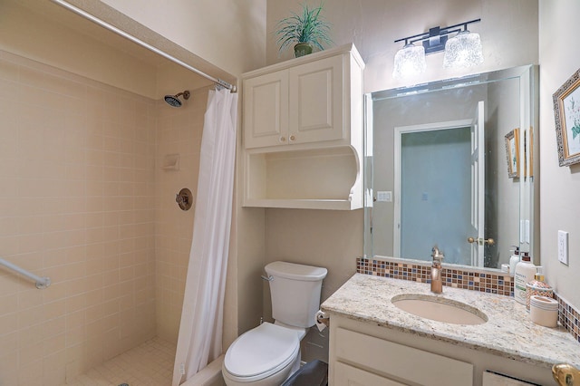 bathroom with toilet, a shower with curtain, and vanity