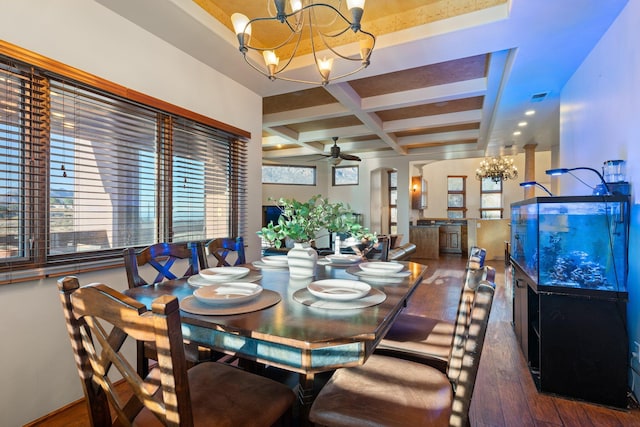 dining space with coffered ceiling, dark wood finished floors, beamed ceiling, and ceiling fan with notable chandelier