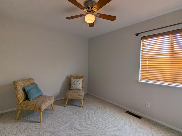 unfurnished room with ceiling fan and carpet floors