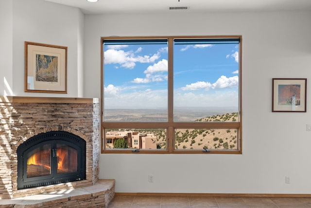 living room featuring light tile patterned flooring and a mountain view