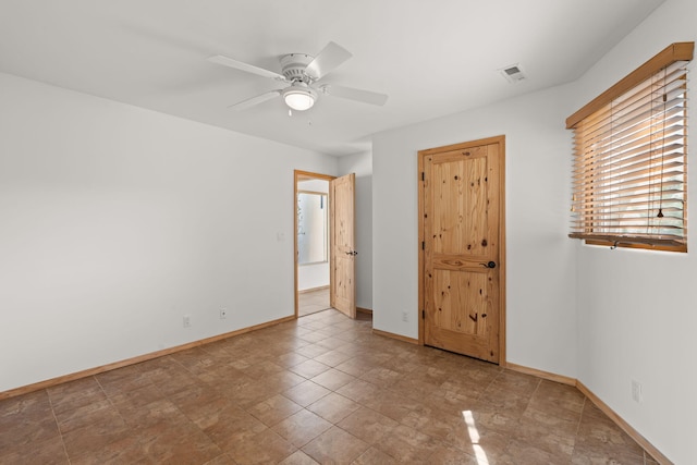 unfurnished bedroom with ceiling fan