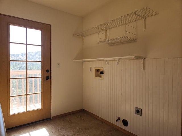 laundry room featuring hookup for a gas dryer, hookup for an electric dryer, washer hookup, and plenty of natural light