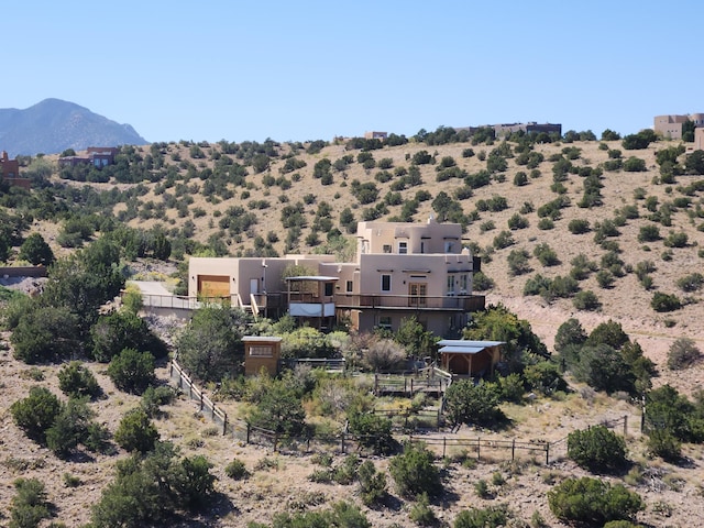 bird's eye view featuring a mountain view and a rural view