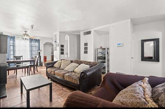 living room with ceiling fan