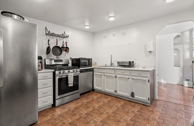 kitchen with appliances with stainless steel finishes and sink