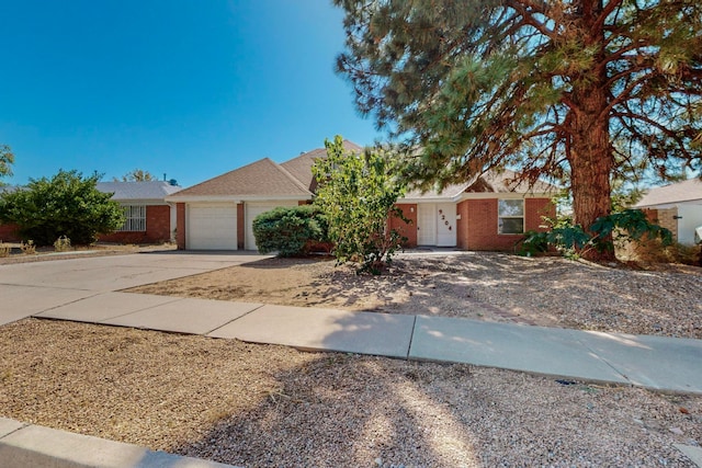 ranch-style home with a garage