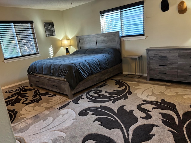 bedroom featuring a textured ceiling