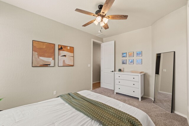 carpeted bedroom featuring ceiling fan