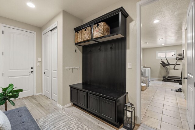 mudroom with light wood-type flooring