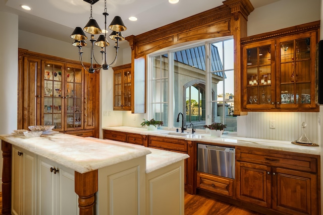 bar featuring dishwasher, sink, hanging light fixtures, an inviting chandelier, and dark hardwood / wood-style floors