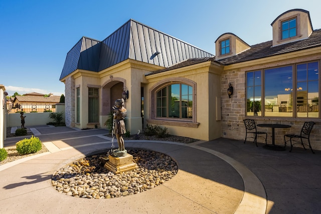 view of front of house featuring a patio area