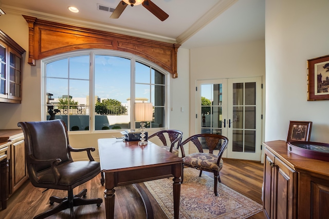 interior space with hardwood / wood-style floors, ceiling fan, crown molding, and french doors