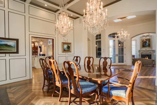 dining space featuring beam ceiling, light parquet floors, ornamental molding, and coffered ceiling