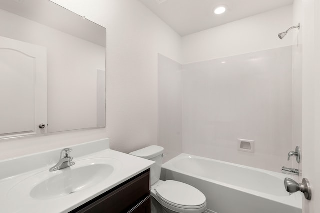 full bathroom featuring shower / washtub combination, vanity, and toilet