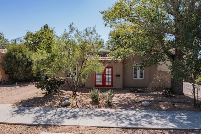 adobe home with french doors