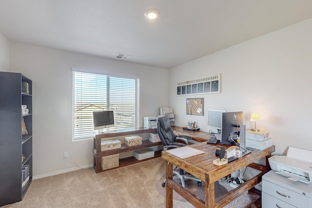 home office featuring light colored carpet