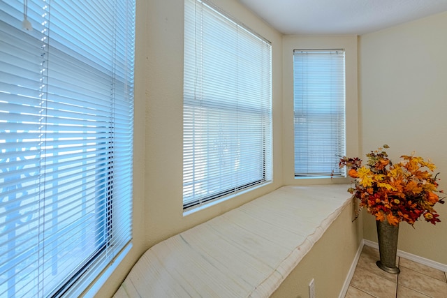 bedroom with light tile patterned flooring