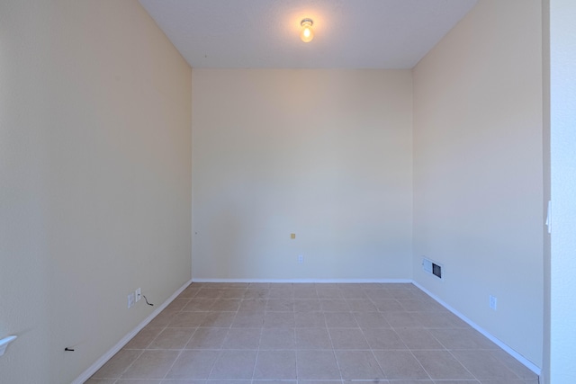 view of tiled spare room