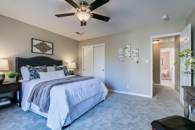 bedroom featuring carpet, ceiling fan, and a closet