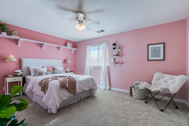 bedroom featuring ceiling fan and light colored carpet