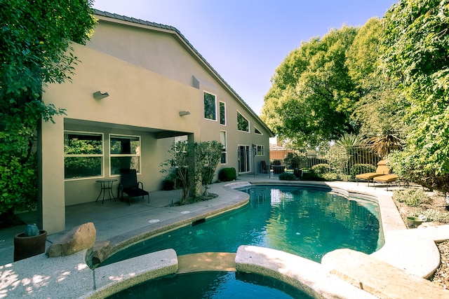 view of pool featuring a patio area