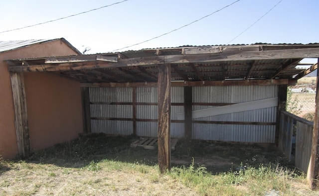 view of outbuilding featuring a carport