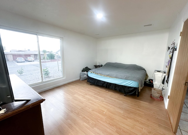 bedroom featuring light hardwood / wood-style flooring