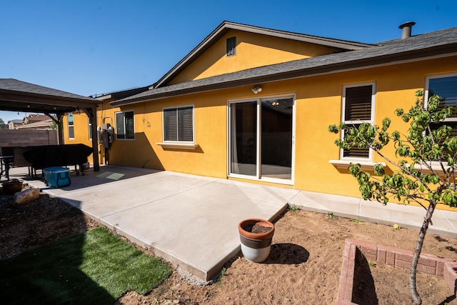 rear view of house with a patio area