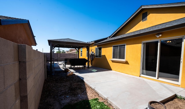 exterior space with a gazebo and a patio area