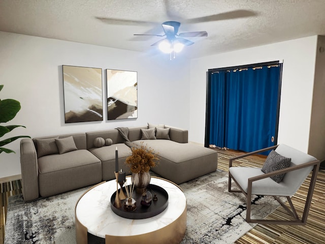 living room with ceiling fan and a textured ceiling