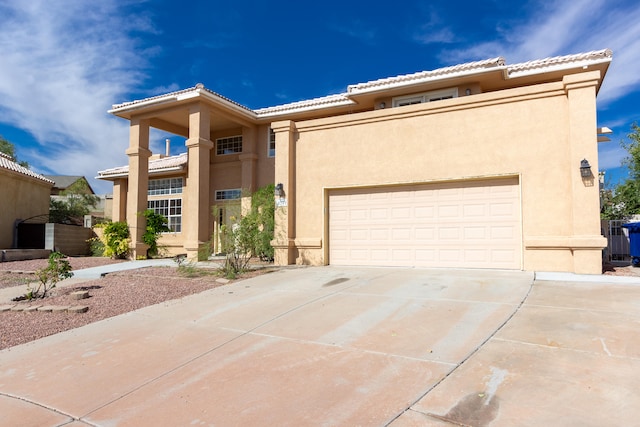 view of front of home with a garage