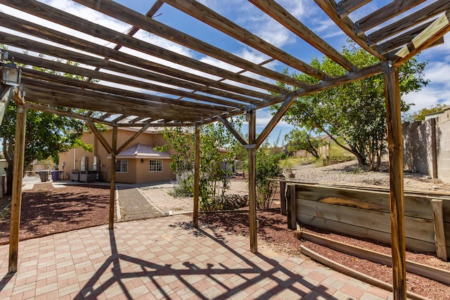 view of patio featuring a pergola