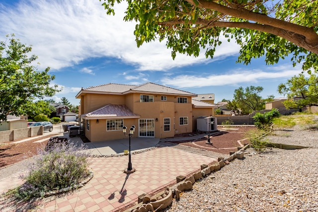 back of house featuring a patio