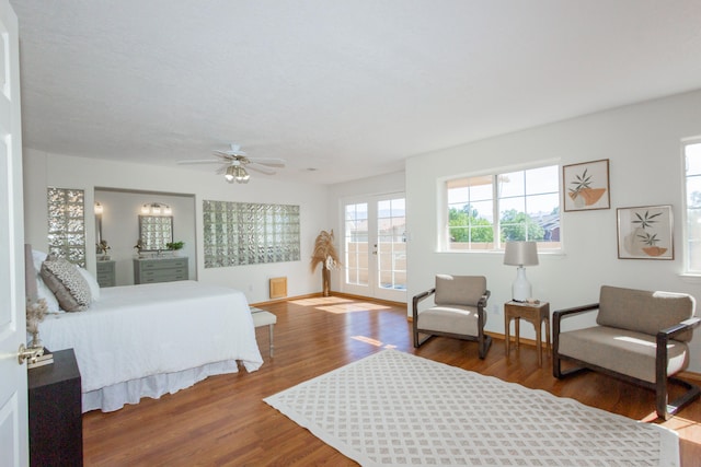 bedroom featuring hardwood / wood-style flooring and ceiling fan