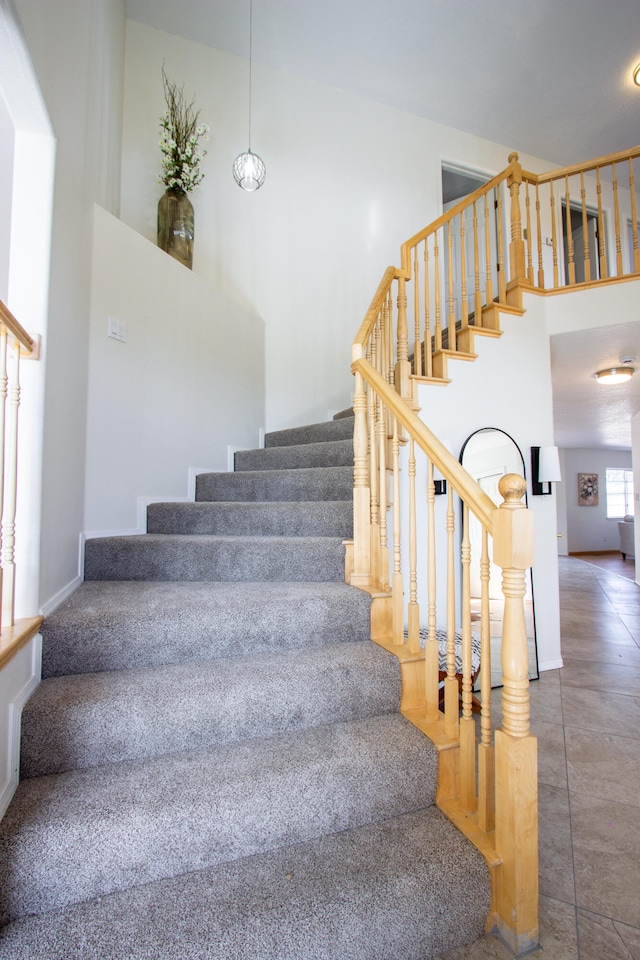 stairway with a high ceiling