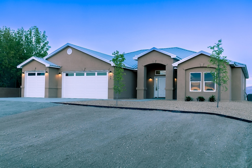 ranch-style home with a garage