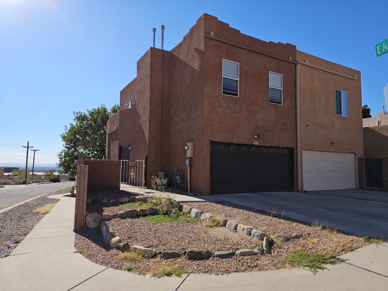 view of side of property with a garage