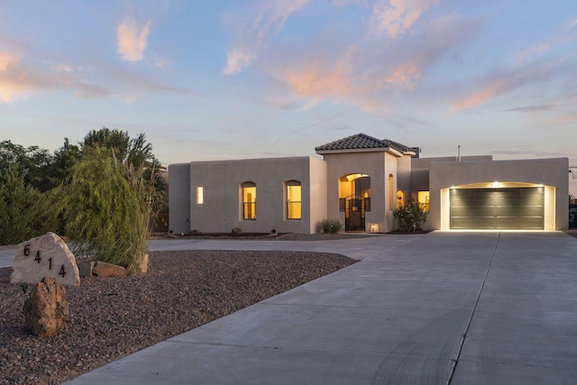 view of front of house with a garage