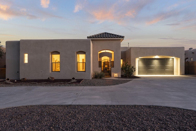 view of front of house with a garage