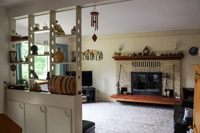 carpeted living room featuring a fireplace