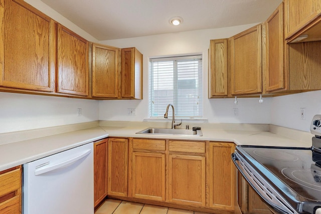 kitchen featuring electric range, light tile patterned flooring, dishwasher, and sink